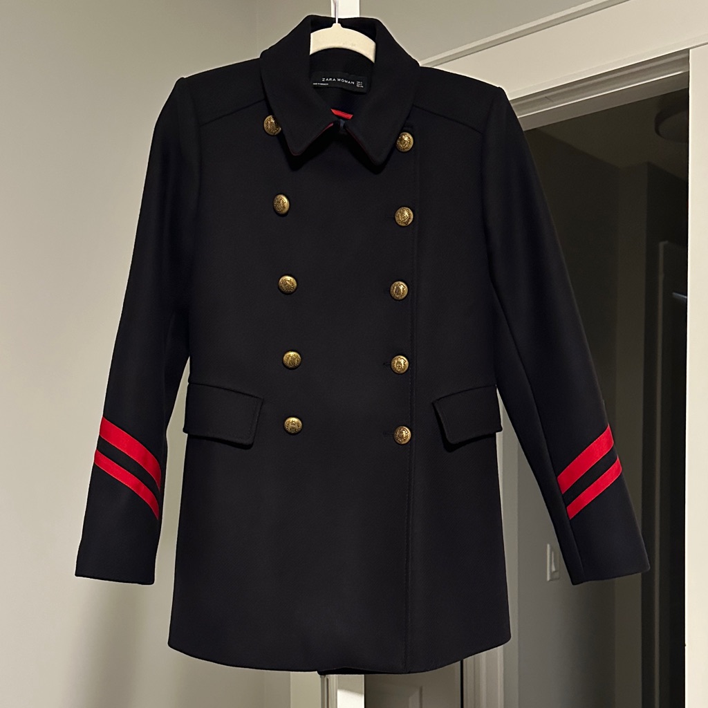 Sophisticated Coat With Red Accents
